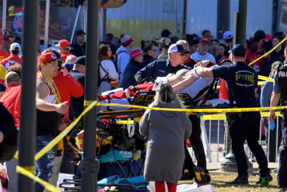Celebration turns tragedy: 1 killed, 21 injured in Kansas City Chiefs' parade shooting. Gunfire erupts during victory celebration, leaving 1 dead and 21 wounded, including 9 children. Police arrest 3 suspects, motive remains unclear. Kansas City mourns and calls for action on gun violence